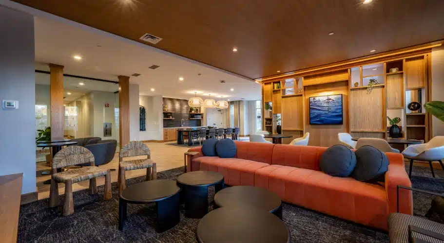 Open seating area in luxury lounge, designed for relaxing, socializing, and casual meetings