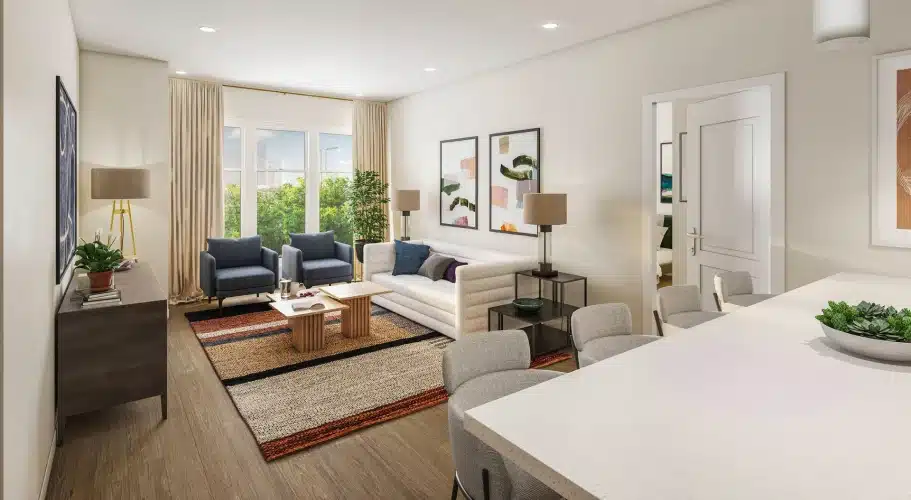 Bright living room with mid-century modern furnishings, large windows, and abstract wall art